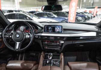 Подержанный автомобиль BMW X6 2017 года (13 фото)