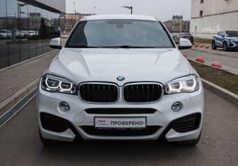Подержанный автомобиль BMW X6 2018 года (2 фото)