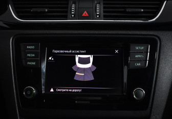 Подержанный автомобиль Skoda Rapid Liftback 2018 года (17 фото)