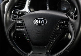 Подержанный автомобиль Kia Ceed Hatchback 2013 года (12 фото)
