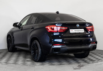 Подержанный автомобиль BMW X6 2015 года (8 фото)