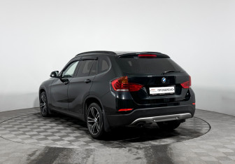 Подержанный автомобиль BMW X1 2014 года (7 фото)