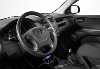 Подержанный автомобиль Kia Sportage 2009 года (9 фото)