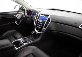 Подержанный автомобиль Cadillac SRX 2013 года (17 фото)