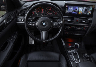 Подержанный автомобиль BMW X4 2016 года (11 фото)