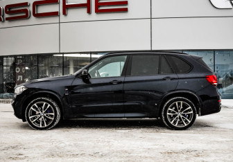 Подержанный автомобиль BMW X5 2016 года (10 фото)