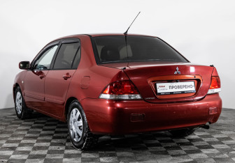 Подержанный автомобиль Mitsubishi Lancer Sedan 2005 года (7 фото)