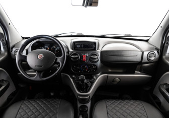 Подержанный автомобиль Fiat Doblo 2012 года (10 фото)