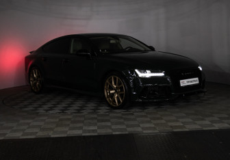Подержанный автомобиль Audi A7 2015 года (29 фото)