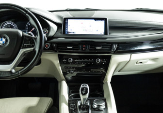Подержанный автомобиль BMW X6 2016 года (26 фото)