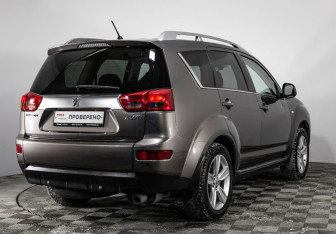 Подержанный автомобиль Peugeot 4007 2012 года (5 фото)