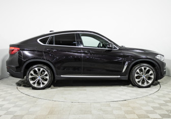 Подержанный автомобиль BMW X6 2016 года (7 фото)