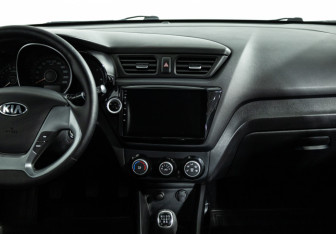 Подержанный автомобиль Kia Rio Sedan 2015 года (14 фото)