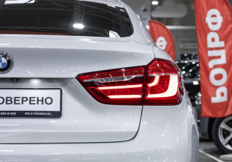 Подержанный автомобиль BMW X6 2016 года (13 фото)