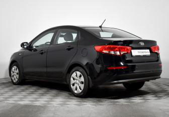 Подержанный автомобиль Kia Rio Sedan 2015 года (7 фото)