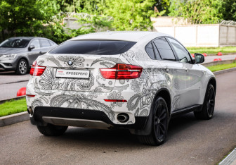 Подержанный автомобиль BMW X6 2013 года (6 фото)