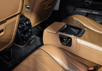 Подержанный автомобиль Jaguar XJ 2016 года (56 фото)