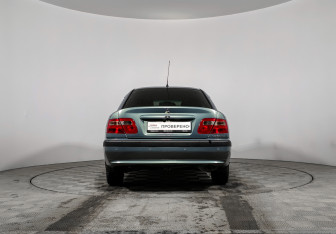 Подержанный автомобиль Mitsubishi Carisma Sedan 2003 года (6 фото)