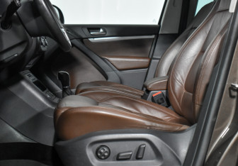 Подержанный автомобиль Volkswagen Tiguan 2014 года (11 фото)