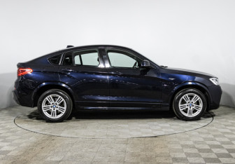 Подержанный автомобиль BMW X4 2015 года (4 фото)