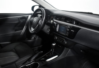 Подержанный автомобиль Toyota Corolla Sedan 2014 года (13 фото)