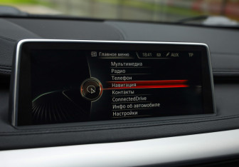 Подержанный автомобиль BMW X6 2015 года (16 фото)