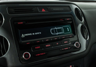 Подержанный автомобиль Volkswagen Tiguan 2013 года (15 фото)