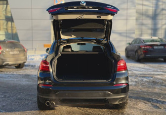 Подержанный автомобиль BMW X4 2015 года (7 фото)