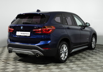 Подержанный автомобиль BMW X1 2015 года (5 фото)