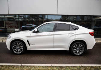Подержанный автомобиль BMW X6 2018 года (7 фото)