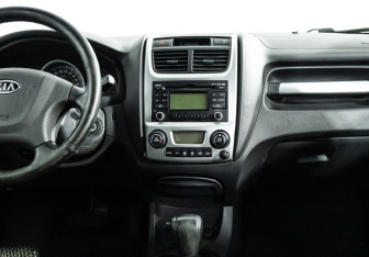 Подержанный автомобиль Kia Sportage 2009 года (14 фото)