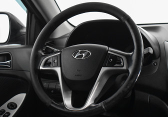 Подержанный автомобиль Hyundai Solaris Sedan 2014 года (14 фото)