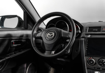 Подержанный автомобиль Mazda 3 Sedan 2006 года (15 фото)