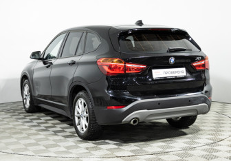 Подержанный автомобиль BMW X1 2017 года (7 фото)
