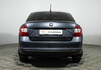 Подержанный автомобиль Skoda Rapid Liftback 2014 года (6 фото)