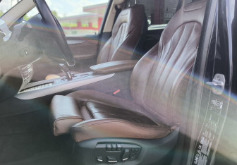 Подержанный автомобиль BMW X5 2014 года (11 фото)