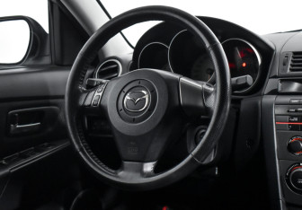 Подержанный автомобиль Mazda 3 Sedan 2007 года (14 фото)