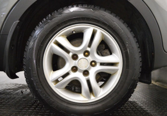 Подержанный автомобиль Kia Sportage 2012 года (9 фото)