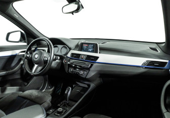 Подержанный автомобиль BMW X1 2018 года (9 фото)