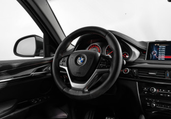 Подержанный автомобиль BMW X6 2015 года (21 фото)