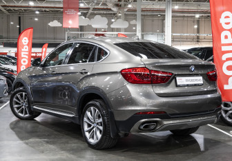 Подержанный автомобиль BMW X6 2019 года (13 фото)