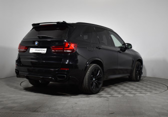 Подержанный автомобиль BMW X5 2014 года (5 фото)