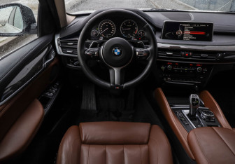 Подержанный автомобиль BMW X6 2016 года (11 фото)
