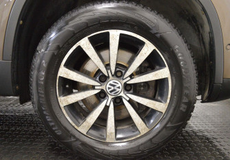 Подержанный автомобиль Volkswagen Tiguan 2014 года (9 фото)