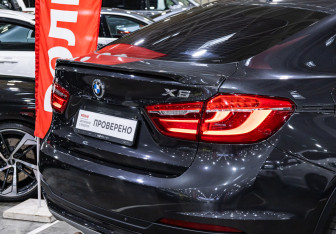 Подержанный автомобиль BMW X6 2016 года (8 фото)