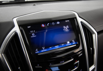 Подержанный автомобиль Cadillac SRX 2013 года (21 фото)