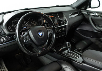 Подержанный автомобиль BMW X4 2016 года (11 фото)