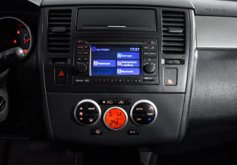 Подержанный автомобиль Nissan Tiida Hatchback 2011 года (16 фото)