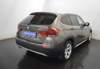 Подержанный автомобиль BMW X1 2012 года (5 фото)