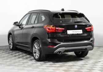 Подержанный автомобиль BMW X1 2016 года (7 фото)
